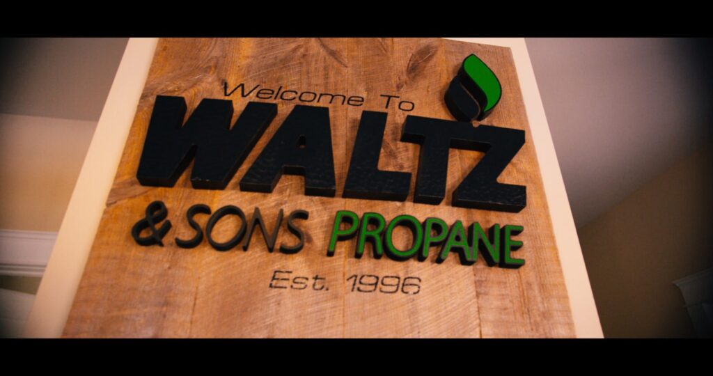 Wooden sign with name Waltz & Sons Propane