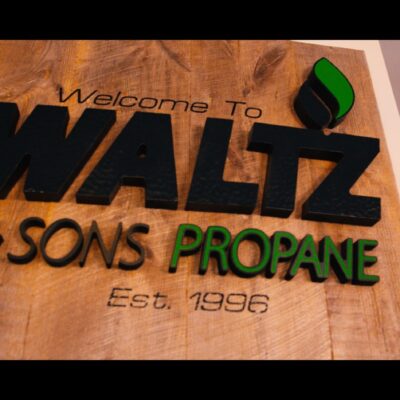 Wooden sign with name Waltz & Sons Propane